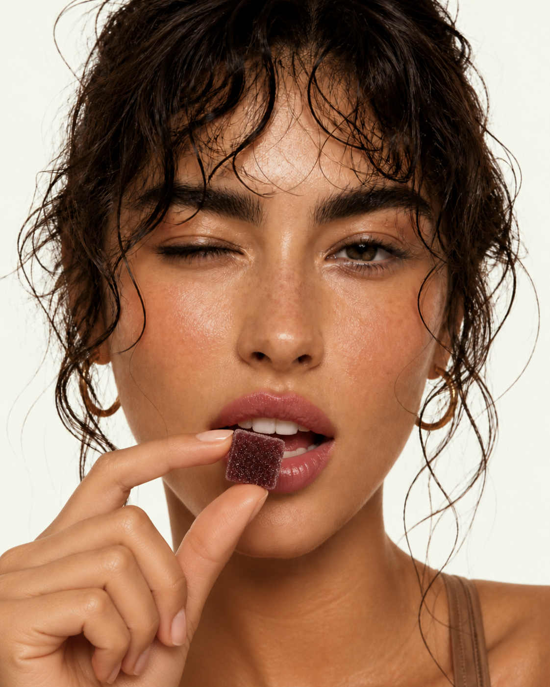 Woman eating a Proxy gummy